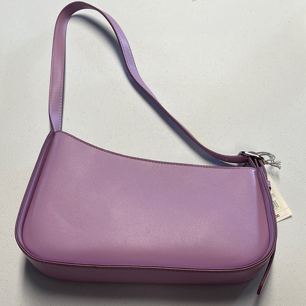 A New Day Purse with adjustable strap length and inside zippered pocket. NWT
